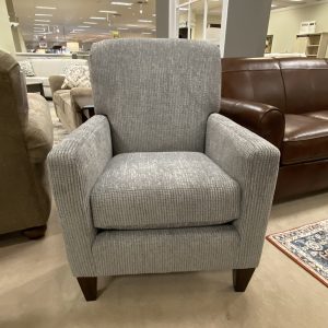Gray armchair in a furniture store display