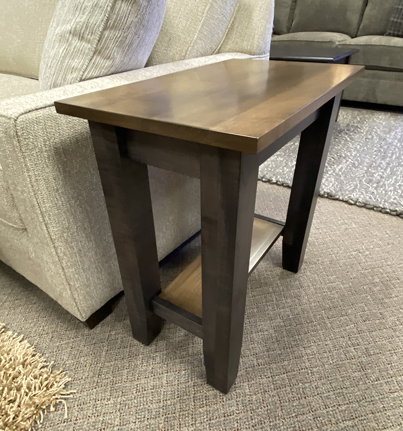Wooden side table next to a sofa
