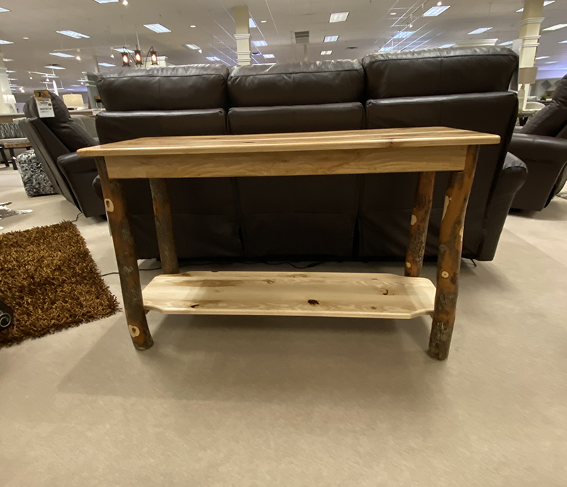 Wooden console table in furniture store display.