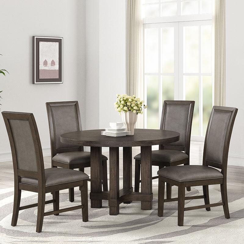 Modern dining set with round table and four chairs.