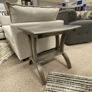 Wooden side table in furniture showroom