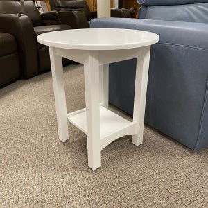 White round side table with lower shelf.