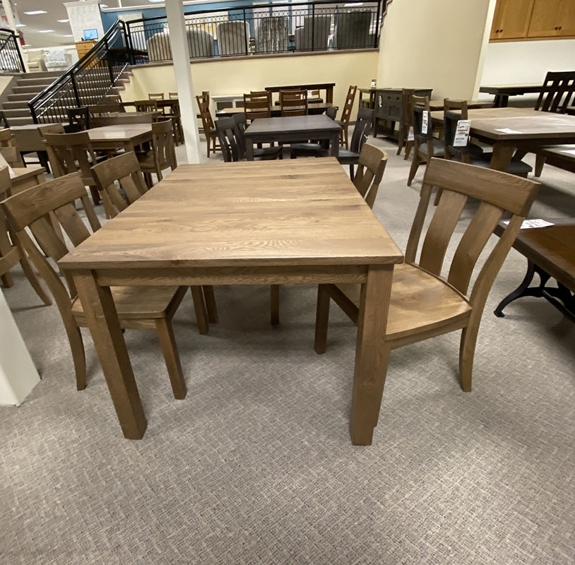 Wooden dining table set in furniture store