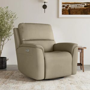 Comfortable beige recliner chair in cozy living room.