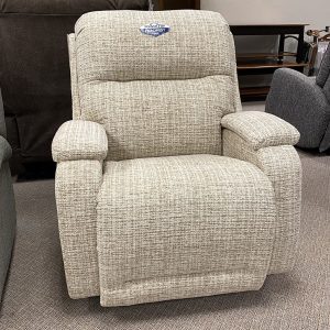 Comfortable beige recliner chair with power headrest.
