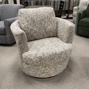 Comfortable upholstered swivel chair in showroom