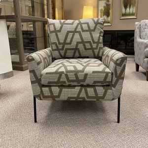 Patterned armchair in modern living room setting