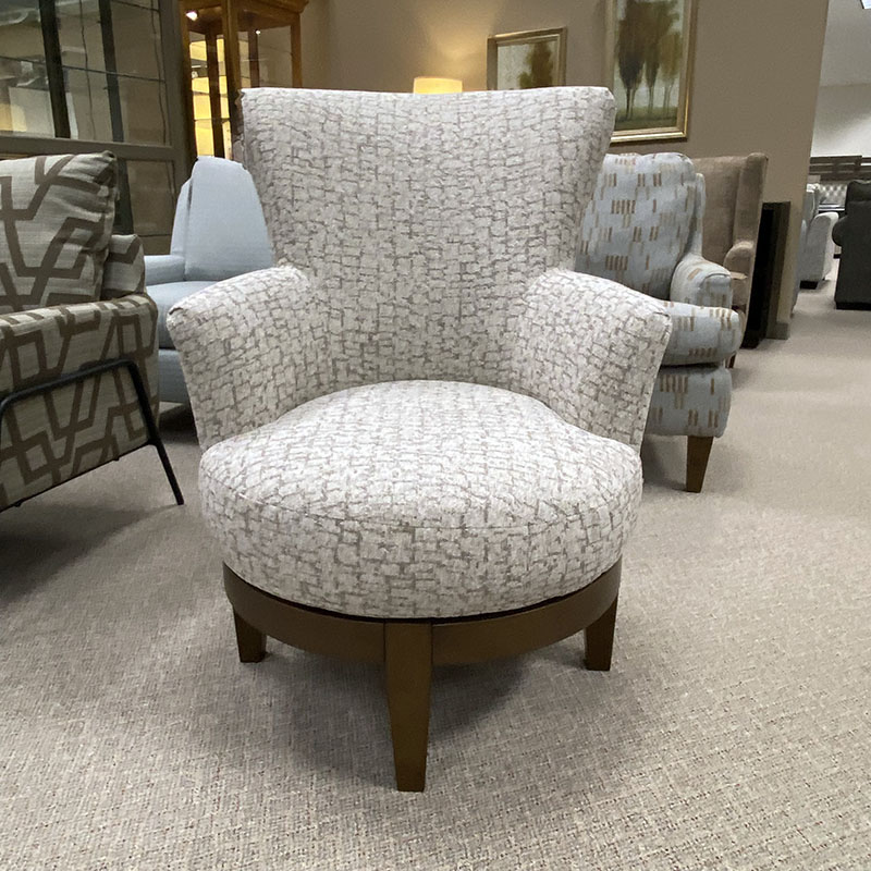 Modern swivel chair with textured fabric upholstery
