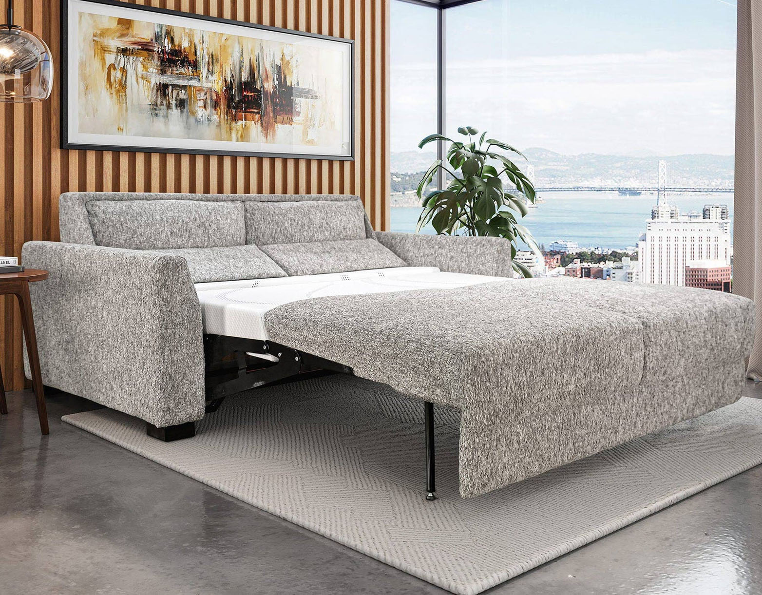 Modern gray sofa bed in stylish room