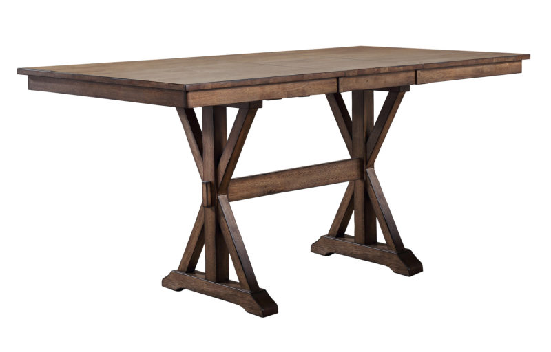 Wooden dining table with trestle legs.