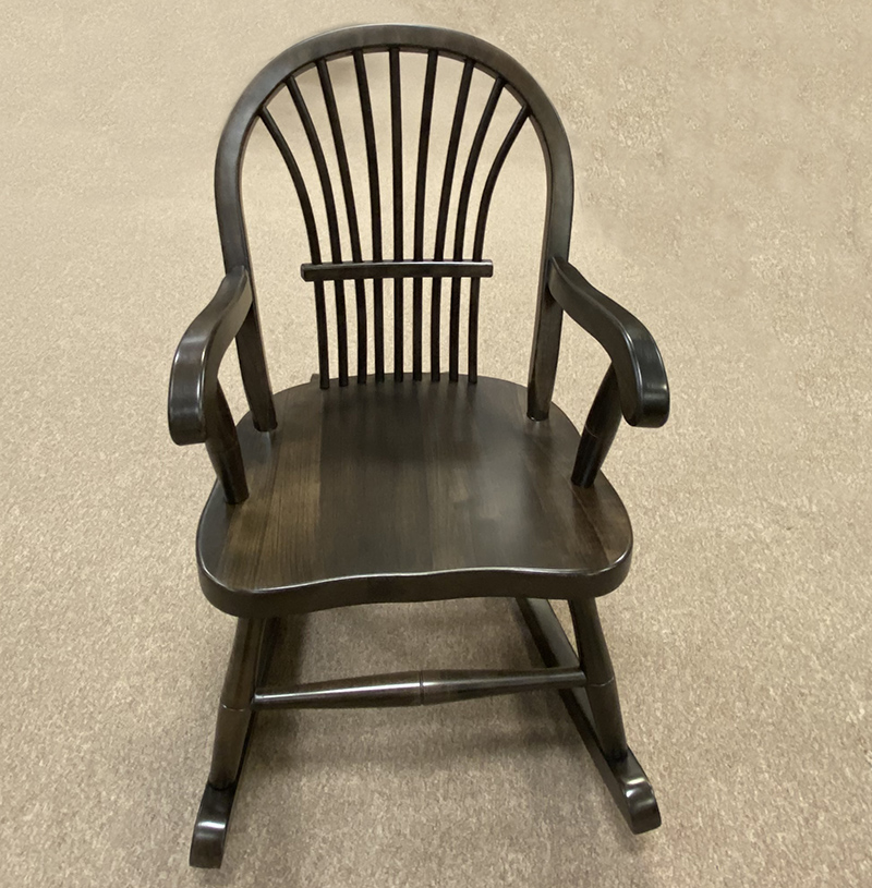 Wooden rocking chair with spindle back design